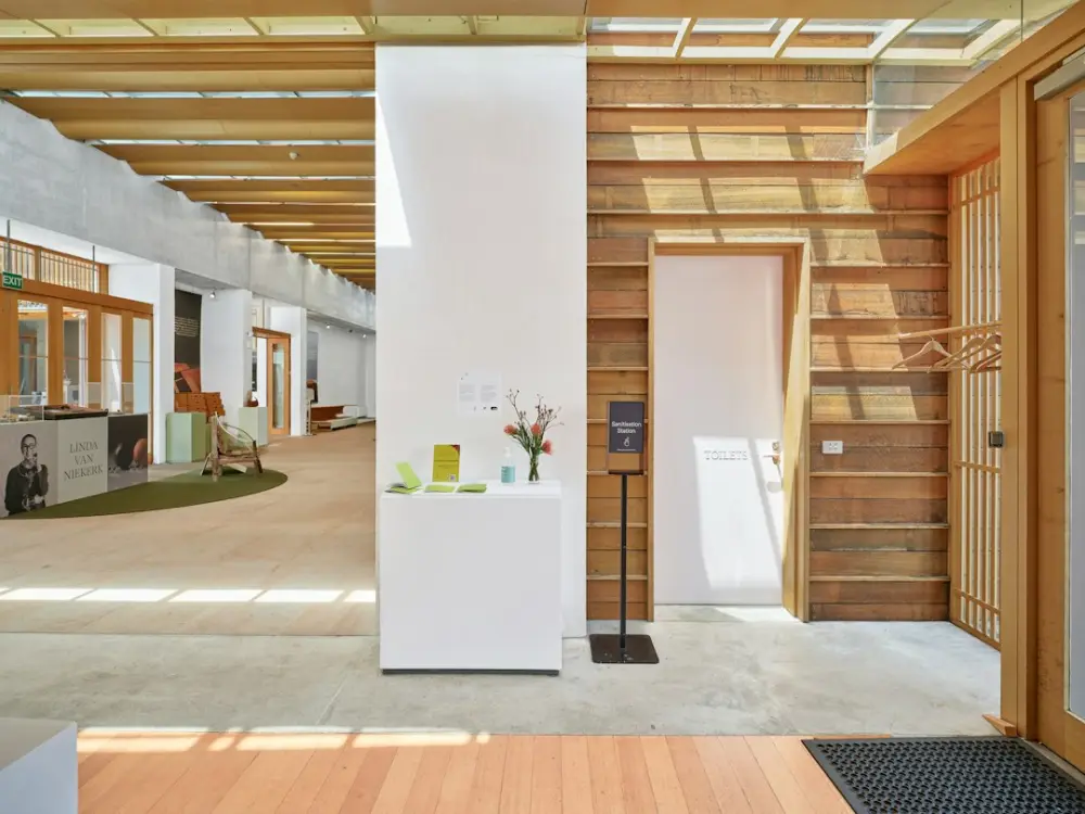 Interior of a modern building with wooden accents, illustrating sustainable interior design